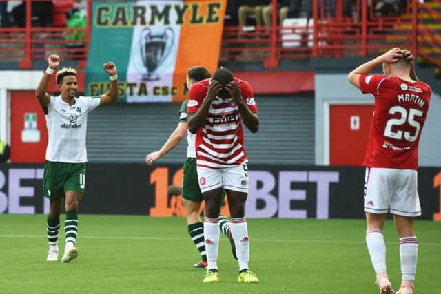 Despair for Hamilton's Scott Martin, right, as Celtic winger Scott Sinclair celebrates his own goal. Picture: Craig Foy/SNS