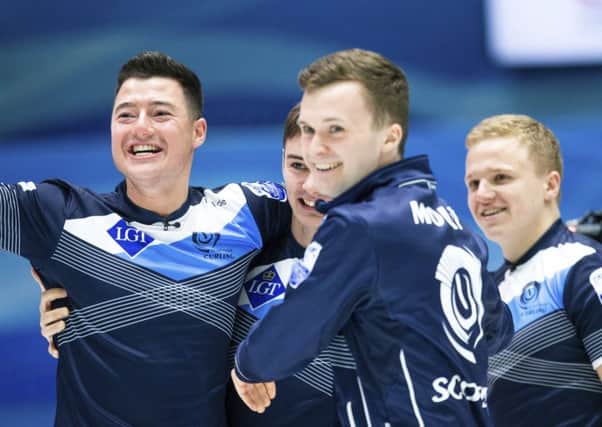 Scotland's Hammy McMillan, left, Bruce Mouat, Grant Hardie, and Bobby Lammie celebrate their victory over Sweden. Picture: Raul Mee/AP