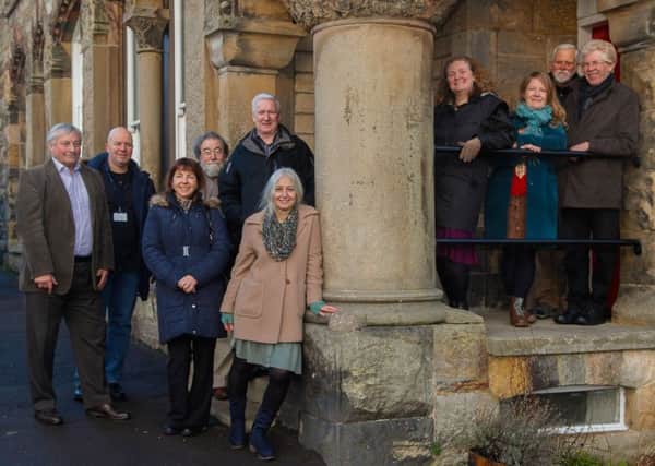 Members of the Penicuik Heritage Regeneration Project 26/11/18 They are pictured at the Park End flats, designed by Frederick Thomas Pilkington, one of the buildings covered by the Project.