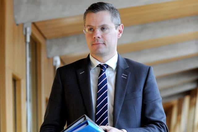 Derek Mackay delivers his statement regarding business rates/income tax at Scottish Parliament today. Picture: Lisa Ferguson.