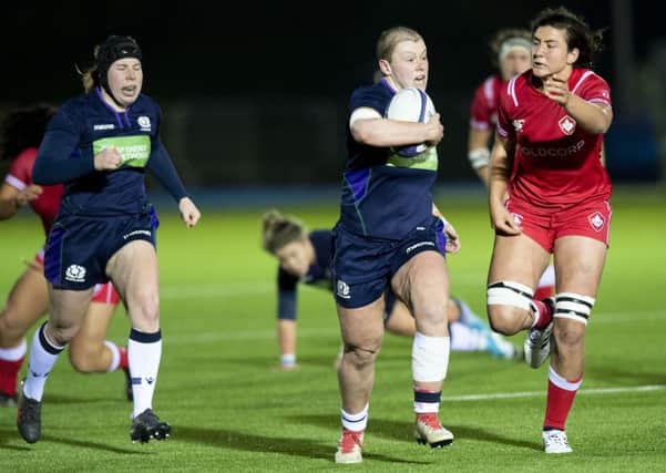Scotland's Megan Kennedy breaks forward during the narrow defeat by Canada in Glasgow. Picture: Ross Parker/SNS/SRU