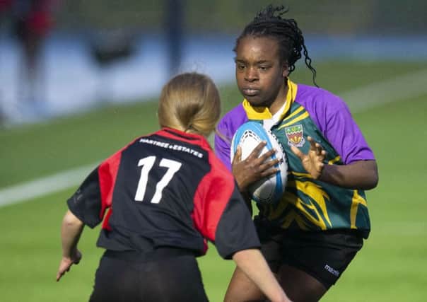 Shawlands' Favour Akinda drives towards Biggar's Molly Edwards. Picture: Bruce White/SNS/SRU