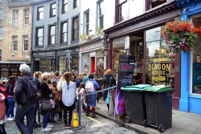 The prettiest street in Edinburgh with its curving candy-coloured row of eclectic shops. Hipper than thou street wear, Scottish designers' wares, joke shops and vintage clothing boutiques.