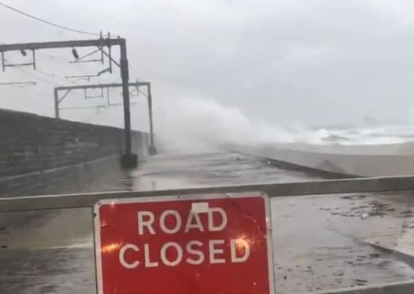 In the video, waves can be seen slamming against the tracks. Picture: ScotRail