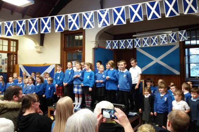 St Andrews Primary School  pupils singing  for parents and friends at the end of their St Andrews Day concert, performing 'As we go now'.