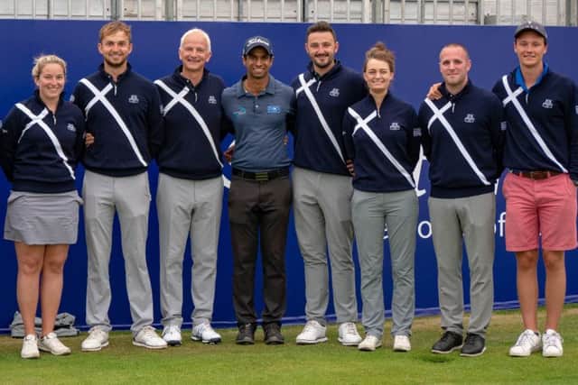 Aaron Rai with Alasdair Good and his staff