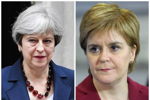 Theresa May has insisted Scotlands business leaders are behind her Brexit deal as she warned Nicola Sturgeon to stop exploiting the issue to push for a second referendum. Pictures: PA