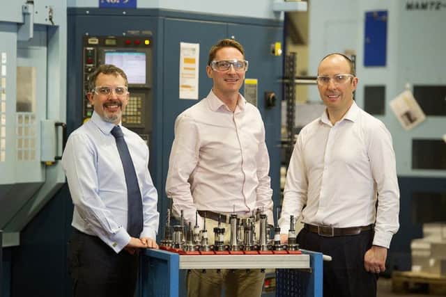 Walker Precision Engineering's Gary (left) and Mark Walker (right) with Paddy Graham from Business Growth Fund (centre). Picture: Peter Sandground