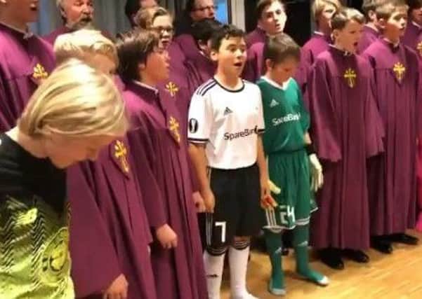 The choir sing 'You'll Never Walk Alone'. Picture: Twitter/Celtic FC