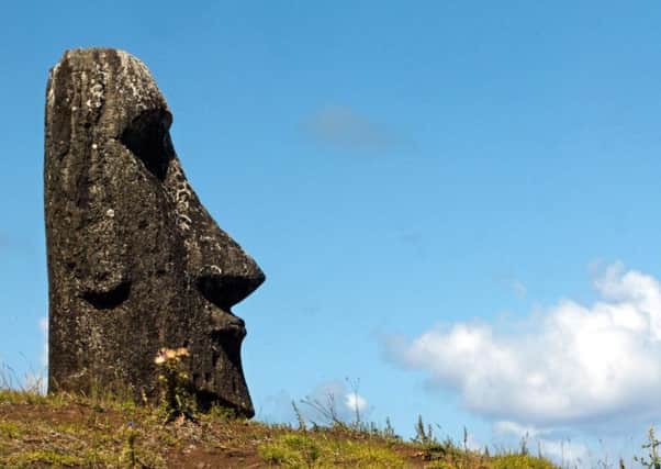 Easter Island's society collapsed after the people living there stripped it of trees (Picture: Martin Bernetti/AFP/Getty Images)