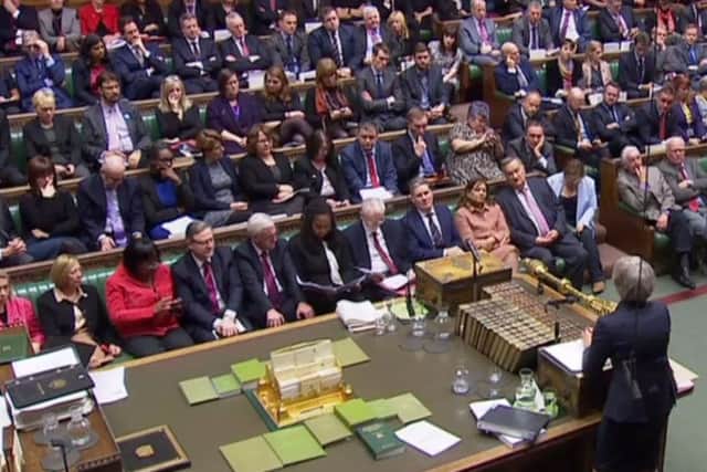 A Government in waiting? The Labour benches listen as Theresa May addresses the Commons (Picture: AFP/Getty)