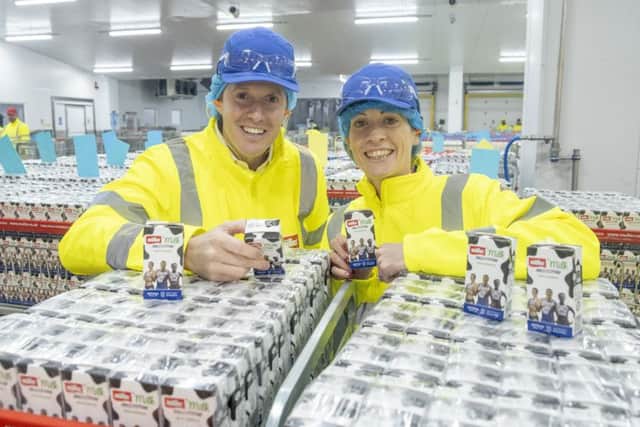 Scottish 400m hurdles record holder Eilidh Doyle joins Müller Milk & Ingredients CEO Patrick Müller to mark the completion of the work at the Bellshill dairy which makes the Official Milk and Milk Drinks of British Athletics.
Pic: Peter Devlin