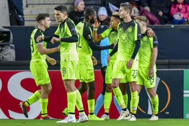 Celtic stars celebrate with Scott Sinclair after his first-half goal. Picture: AP