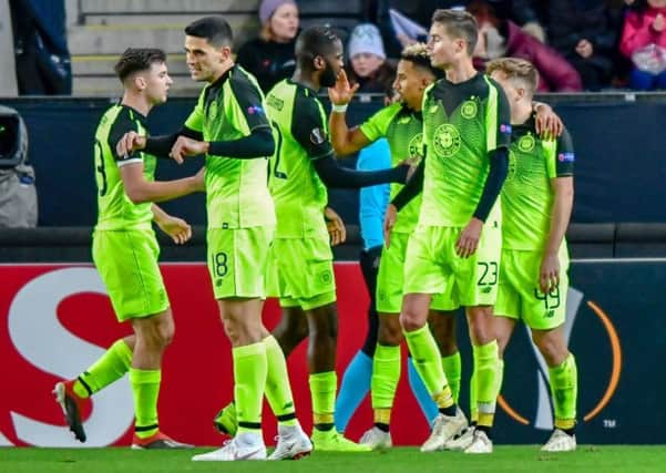 Celtic players celebrate the wining goal against Rosenborg. Picture: OLE MARTIN WOLD/AFP/Getty