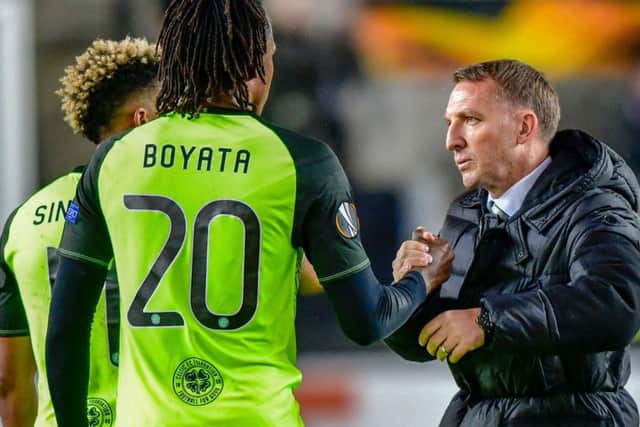 Celtic manager Brendan Rodgers with Dedryck Boyata after the win over Rosenborg. Picture: Ole Martin Wold/AFP/Getty Images
