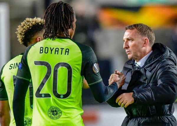 Celtic manager Brendan Rodgers with Dedryck Boyata after the win over Rosenborg. Picture: Ole Martin Wold/AFP/Getty Images