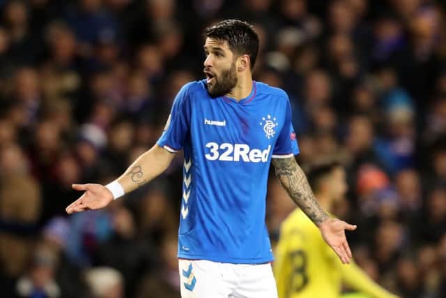 Rangers midfielder Daniel Candeias is incredulous after receiving a second yellow card. Picture: PA