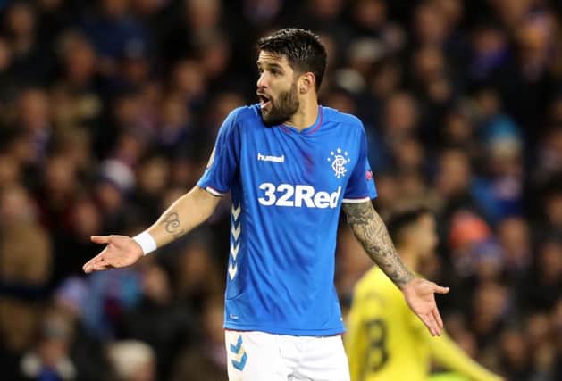 Rangers midfielder Daniel Candeias is incredulous after receiving a second yellow card. Picture: PA