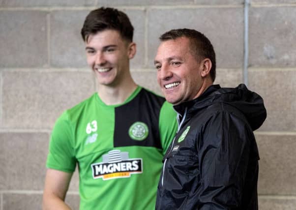 Kieran Tierney shares a laugh with Celtic boss Brendan Rodgers. Picture: SNS Group