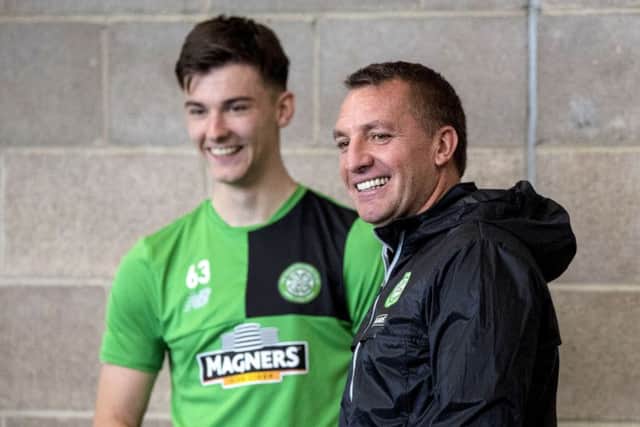 Kieran Tierney shares a laugh with Celtic boss Brendan Rodgers. Picture: SNS Group