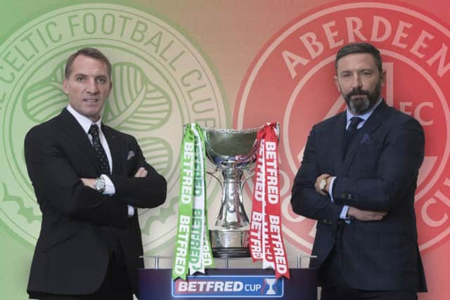 Aberdeen manager Derek McInnes, right, is facing up to Celtic counterpart Brendan Rodgers in a cup final for the third time. Picture: Craig Foy/SNS