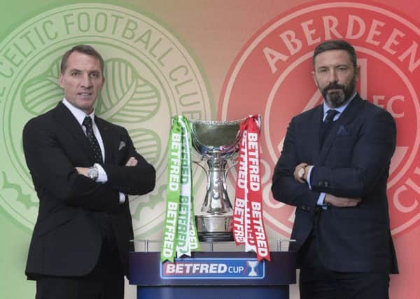 Aberdeen manager Derek McInnes, right, is facing up to Celtic counterpart Brendan Rodgers in a cup final for the third time. Picture: Craig Foy/SNS