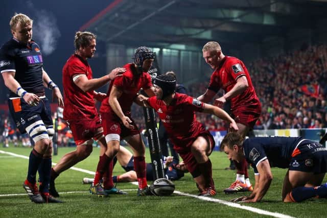 Munster's Tyler Bleyendaal celebrates after scoring his side's seventh try against Edinburgh. Picture: Tommy Dickson/INPHO/REX/Shutterstock