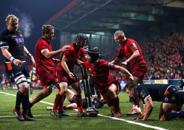 Munster's Tyler Bleyendaal celebrates after scoring his side's seventh try against Edinburgh. Picture: Tommy Dickson/INPHO/REX/Shutterstock