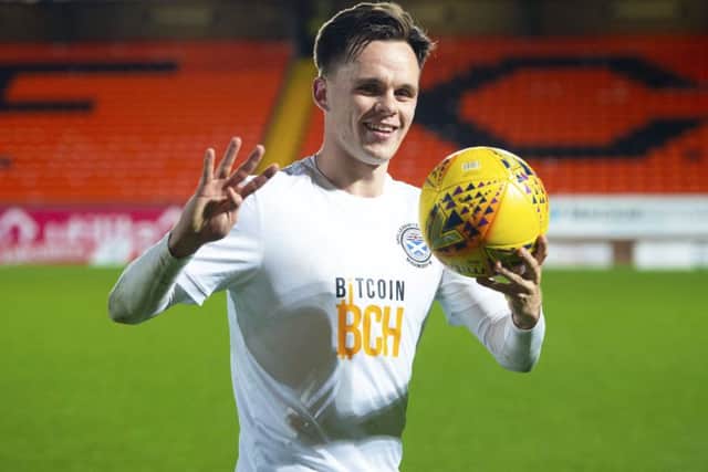 Ayr United's Lawrence Shankland celebrates after his four-goal haul against Dundee United. Picture: Gary Hutchison/SNS