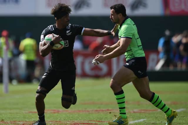 Jamie Farndale of Scotland, right, in action against Luke Masirewa of New Zealand at the Dubai Sevens quarter-final. Picture: Tom Dulat/Getty Images