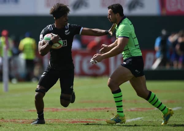 Jamie Farndale of Scotland, right, in action against Luke Masirewa of New Zealand at the Dubai Sevens quarter-final. Picture: Tom Dulat/Getty Images