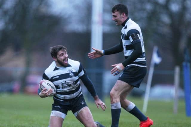 Heriots' Craig Robertson runs over for the final try of the match. Pic: SNS/SRU/Graham Stewart