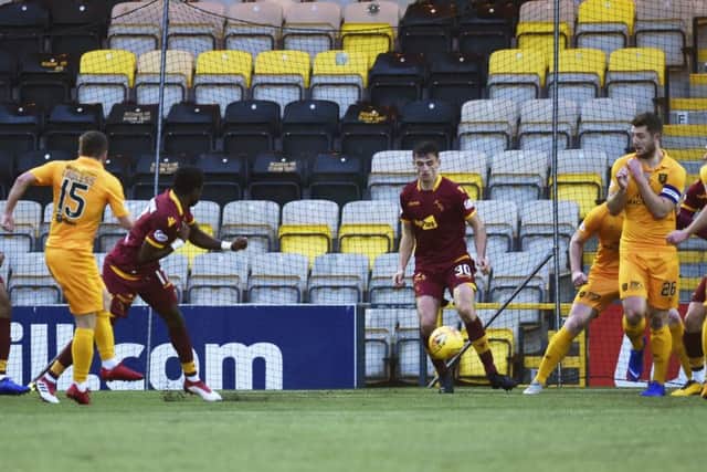 Steven Lawless fires Livingston ahead. Pic: SNS/Rob Casey