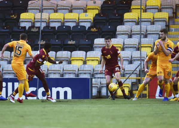 Steven Lawless fires Livingston ahead. Pic: SNS/Rob Casey