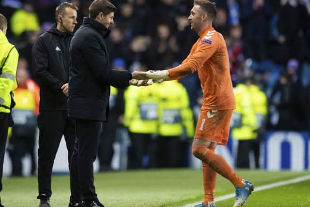 Steven Gerrard congratulates Allan McGregor after Villarreal draw. Pic: SNS