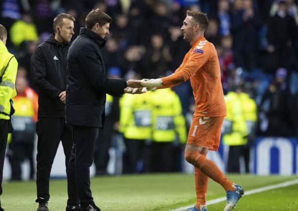 Steven Gerrard congratulates Allan McGregor after Villarreal draw. Pic: SNS