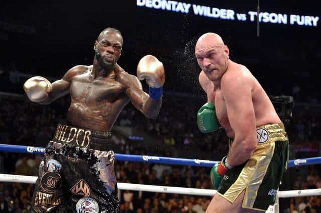 Deontay Wilder and Tyson Fury during the WBC Heavyweight Championship bout at the Staples Center in Los Angeles. Picture: PA