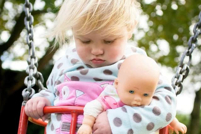 A dad snapped a cute photo of his toddler falling asleep in her swing - not realising that her tiredness was a symptom of undiagnosed cancer. Picture: SWNS