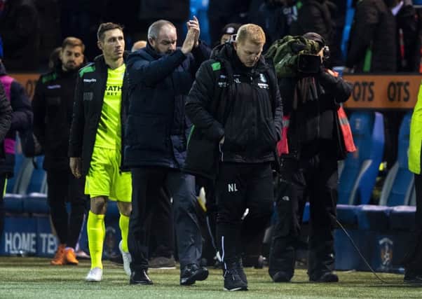Hibs head coach Neil Lennon trudges back to the dressing room while Kilmarnock boss Steve Clarke applauds the home support. Picture: Alan Harvey/SNS Group