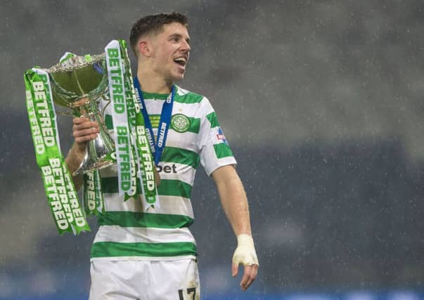 Celtic star Ryan Christie with the Betfred Cup trophy. Picture: SNS