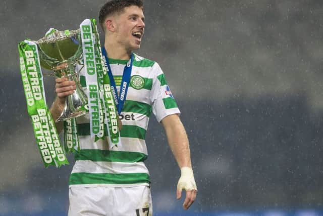 Celtic star Ryan Christie with the Betfred Cup trophy. Picture: SNS