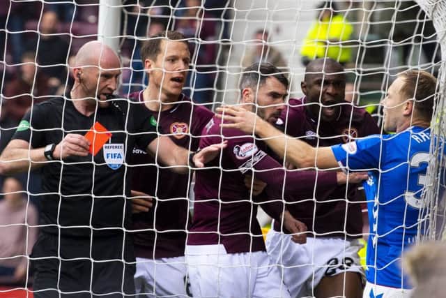 Scott Arfield picked up Rangers' seventh red card of the season in the clash with Hearts. Picture: SNS/Ross Parker