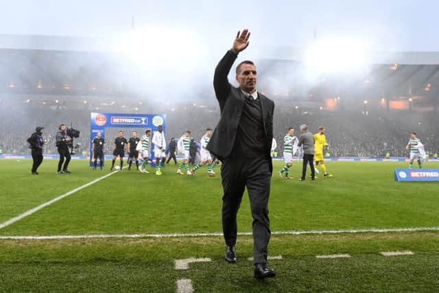 Celtic manager Brendan Rodgers salutes the fans at Hampden.