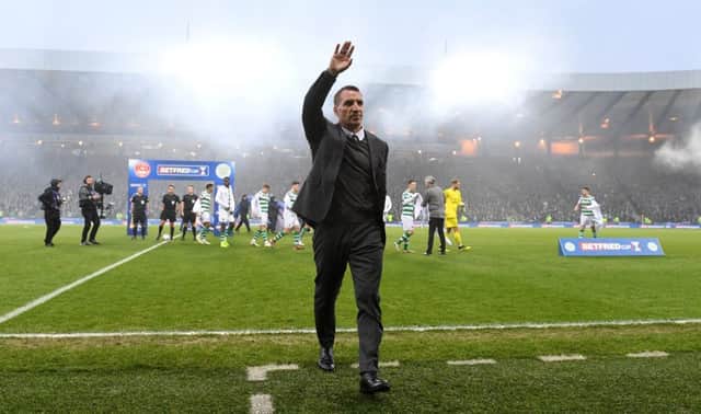 Celtic manager Brendan Rodgers salutes the fans at Hampden.