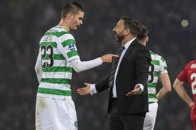 Celtic's Mikael Lustig exchanges words with Aberdeen manager Derek McInnes after the Betfred Cup final. Picture: Alan Harvey/SNS