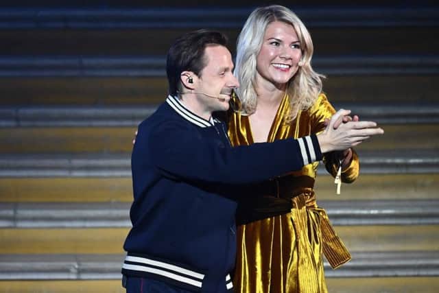 DJ Martin Solveig dances with Ada Hegerberg before asking her to twerk. Picture: Franck Fife/AFP/Getty Images