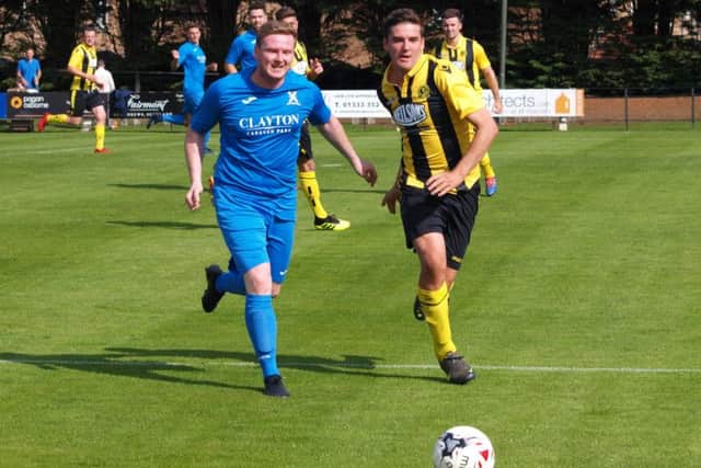The United attack forces pressure onto the Camelon goal. Pic by Blair Smith.
