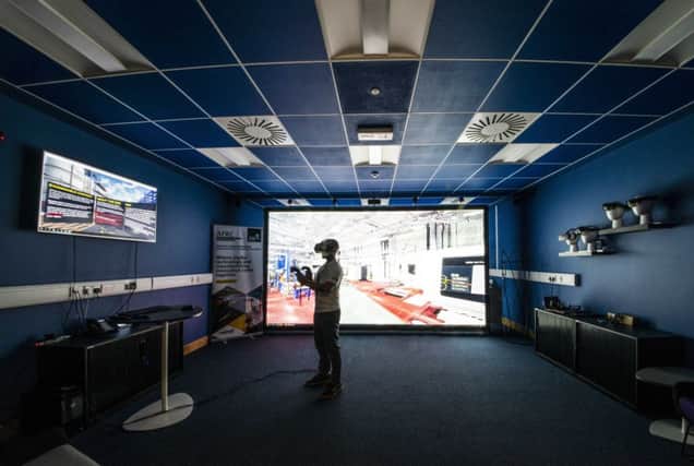 The centre-piece is a projection system with head and hand tracking systems. Picture: Contributed