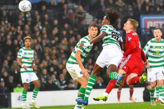 Dedryck Boyata and Aberdeen's Gary Mackay-Steven compete for the ball during the Betfred Cup final and suffer a nasty clash of heads. Picture: SNS