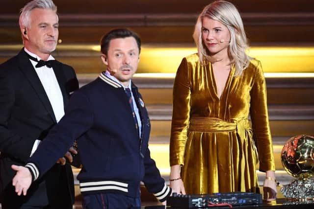 Ada Hegerberg, right, with David Ginola (left) and Martin Solveig. Picture: AFP/Getty Images